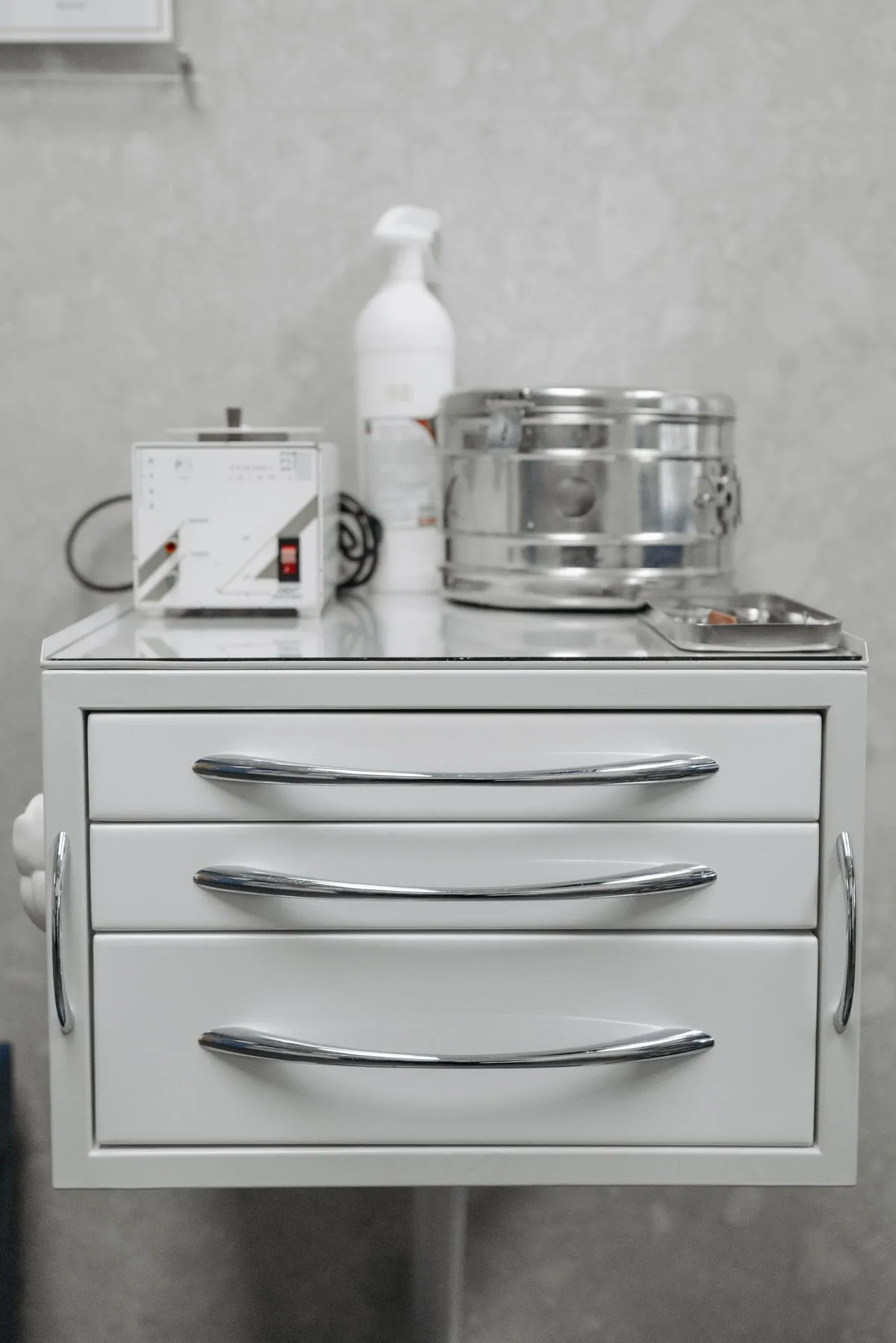 Sterilised dental instruments stored in a cabinet