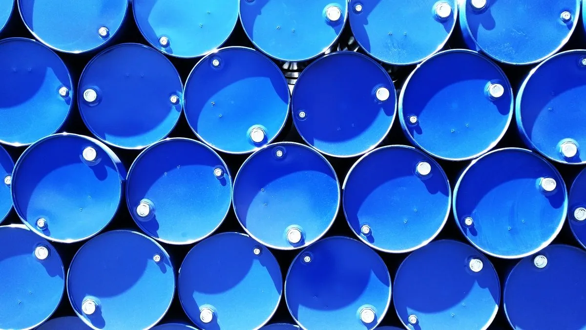Industrial barrels stacked in a storage yard